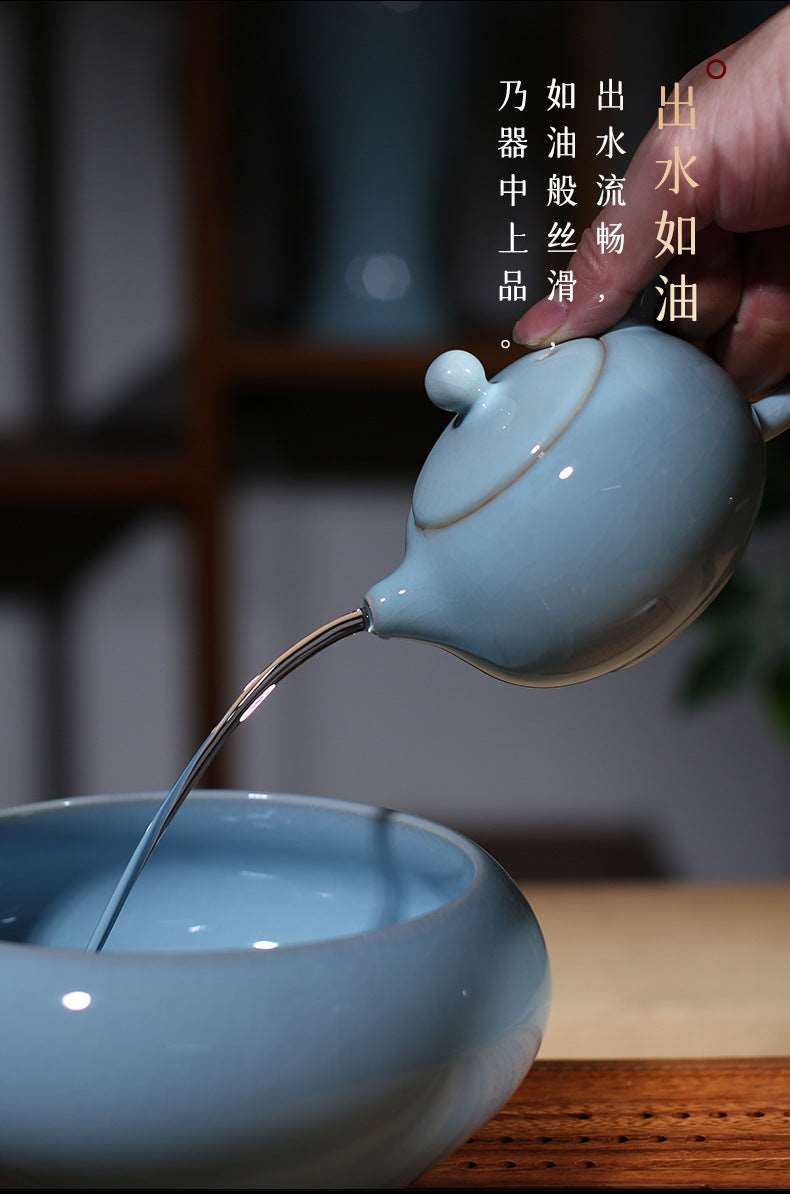 This set of Ru porcelain teapot sets as a whole presents a light and elegant sky-blue color, just like the sky after a rainstorm when it clears up. It's fresh and natural, giving people a sense of tranquility and far-reaching aspiration. The colors of the teapot and the teacups are uniform, and the glaze is smooth, warm and delicate, exuding a primitive, simple and elegant temperament, fully demonstrating the unique charm of Ru porcelain. 