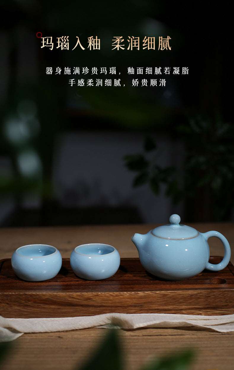 This set of Ru porcelain teapot sets as a whole presents a light and elegant sky-blue color, just like the sky after a rainstorm when it clears up. It's fresh and natural, giving people a sense of tranquility and far-reaching aspiration. The colors of the teapot and the teacups are uniform, and the glaze is smooth, warm and delicate, exuding a primitive, simple and elegant temperament, fully demonstrating the unique charm of Ru porcelain. 