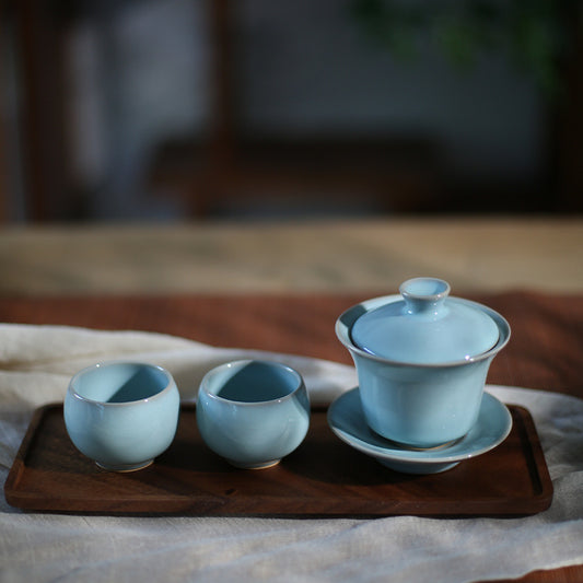 This set of Ru porcelain teapot sets as a whole presents a light and elegant sky-blue color, just like the sky after a rainstorm when it clears up. It's fresh and natural, giving people a sense of tranquility and far-reaching aspiration. The colors of the teapot and the teacups are uniform, and the glaze is smooth, warm and delicate, exuding a primitive, simple and elegant temperament, fully demonstrating the unique charm of Ru porcelain. 