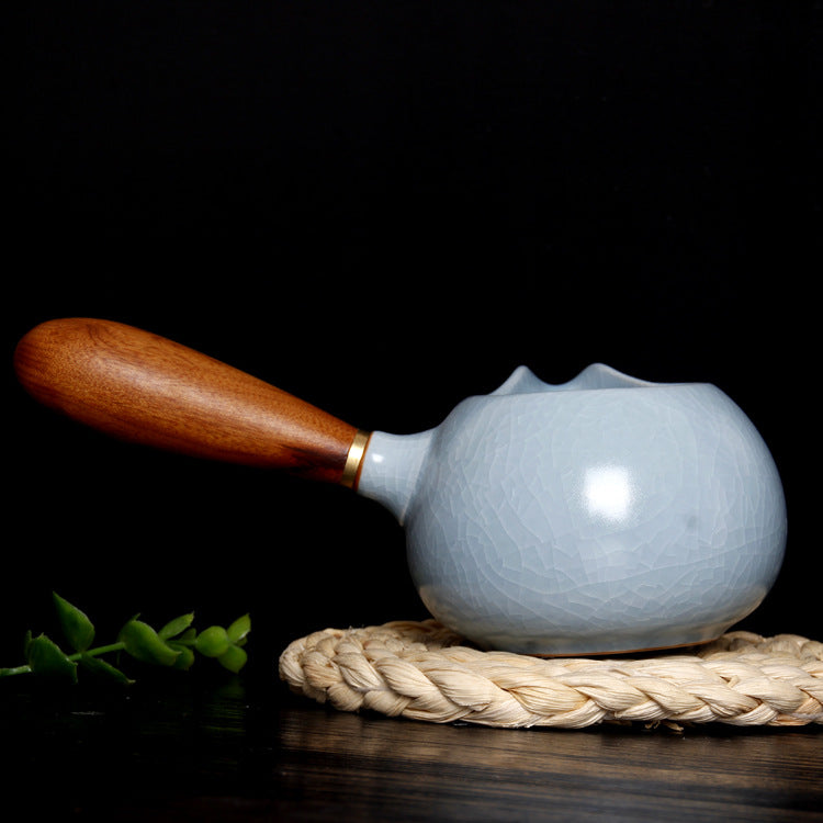 The picture of the fairness cup of Ru Kiln. Its glaze color is the classic sky-blue, just like the sky after the rain stops and the sky clears, being gentle and soft, giving people a sense of tranquility and elegance. The body of the cup is covered with fine crackle patterns that are naturally intertwined and as light as cicada wings. This is the unique artistic feature of Ru Kiln porcelain, demonstrating the superb level of the firing technique of Ru porcelain. 