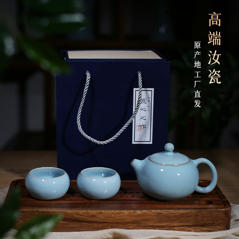 This set of Ru porcelain teapot sets as a whole presents a light and elegant sky-blue color, just like the sky after a rainstorm when it clears up. It's fresh and natural, giving people a sense of tranquility and far-reaching aspiration. The colors of the teapot and the teacups are uniform, and the glaze is smooth, warm and delicate, exuding a primitive, simple and elegant temperament, fully demonstrating the unique charm of Ru porcelain. 